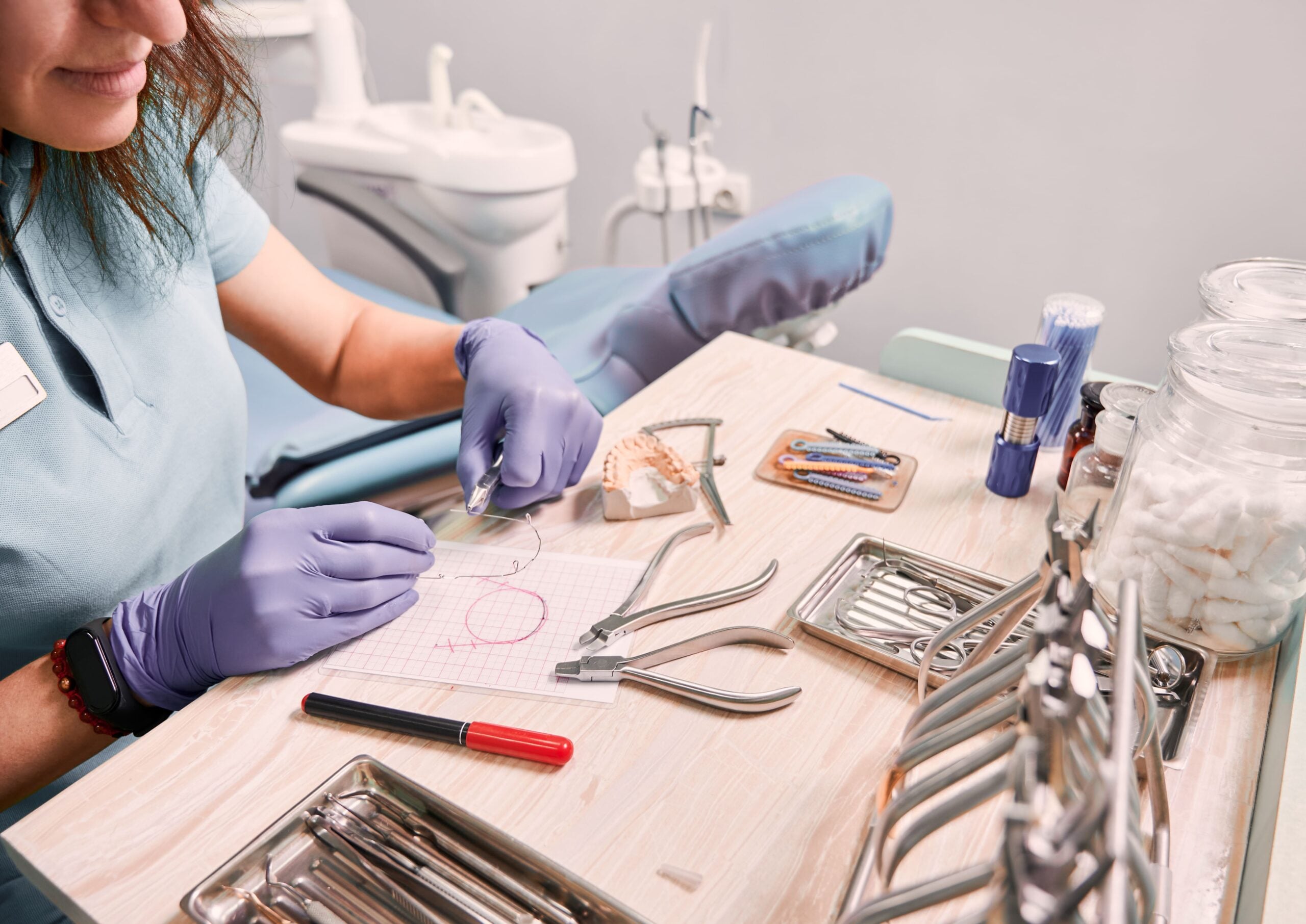 female-orthodontist-working-in-dental-office